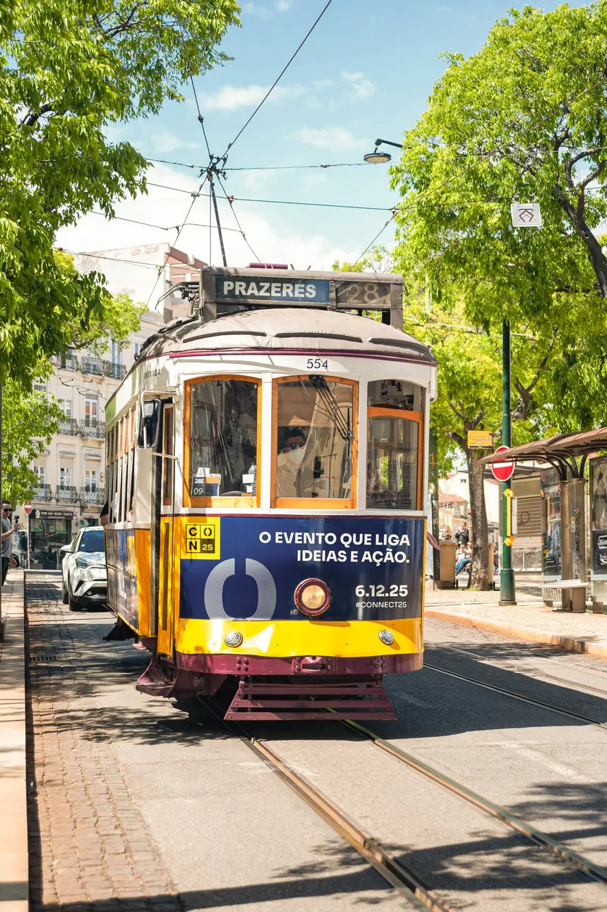 A Lisbon tram with the Connect 25 ad: O evento que liga ideias e ação, 6.12.25